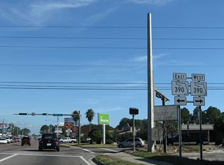 Leading northeast  from W 23rd Street  to the city of Lynn Haven, SR 390 expands to a four lane, divided arterial.
