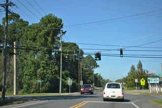 Northside Drive north and Stanford Road south come together at the succeeding traffic light along Airport Road north.