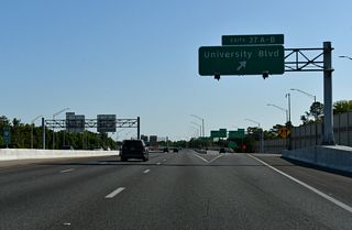 Exit 37 departs from the EPass lanes for University Boulevard. SR 417 previously reduced to four overall lanes from this point northward, however the master plan for the Seminole Expressway calls for eight overall lanes northward to Sanford.