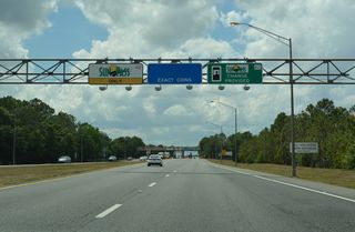 The inside lane in each direction of the Celebration Main Plaza was converted for all electronic tolling. These lanes closed with the removal of cash toll collection along SR 417 in 2025.