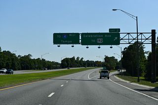 Entering the diamond interchange (Exit 2) with Celebration Avenue on SR 417 south. Celebration Avenue meanders south from U.S. 192 and SR 417 to the Celebration Town Center. Celebration is a master planned community originally developed by the Walt Disney Corporation.