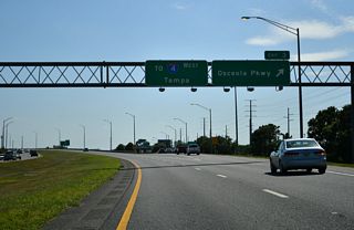 Exit 3 leaves SR 417 south for Osceola Parkway. Osceola Parkway (CR 522) leads west to I-4, Victory Drive for the ESPN Wide World of Sports Complex, World Drive for Disney's Hollywood Studios and Disney's Animal Kingdom.