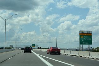 Ramps to Florida's Turnpike opened using electronic tolling (AET), with collection via EPass / Sunpass transponder readers or toll-by-plate.