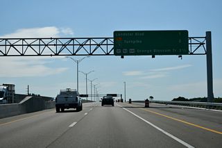 Landstar Boulevard meets SR 417 south in one mile. The subsequent exit connects the GreeneWay with Florida's Turnpike.