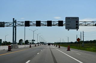 A $71 million project from October 2013 to February 12, 2016 upgraded the upcoming interchange with Boggy Creek Road to include high speed flyovers to Jeff Fuqua Boulevard, the access expressway north to MCO Airport.3
