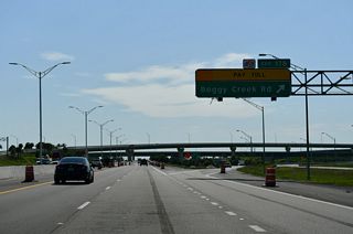 Serving the Air Cargo areas of Orlando International Airport, Boggy Creek Road travels northwest from Exit 17B to Tradeport Road, Dowden Road, and SR 528 at SR 482 (McCoy Road). South from SR 417, Boggy Creek Road continues 1.3 miles to CR 530 at the Osceola County line. CR 530 overtakes Boggy Creek Road east to Fells Cove and follows Simpson Road southwest to the Buena Ventura Lakes community.