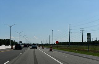 Entering the Orlando city limits, SR 417 advances westward to Jeff Fuqua Boulevard north to Orlando International Airport (MCO) within the next three miles.