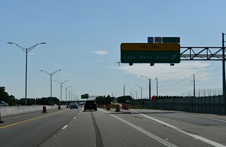 SR 417 parallels the OUC Railroad to Exit 19. The exchange with Lake Nona Boulevard opened in early 2007.