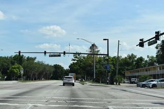 Orange Center Boulevard is a minor arterial leading east from John Young Parkway onto Gore Avenue and west 0.24 miles as a major collector to S Goldwyn Avenue at the Washington Shores subdivision.