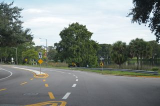 Lake Adair comes into view as Edgewater Drive shifts east to Lakeview Street. Unsigned CR 424 splits with Edgewater Drive east to I-4 ahead.