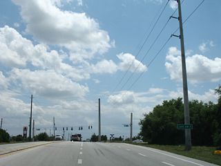 East from the industrial south side of Tavares, CR 448 parallels a Florida Central Railroad line five miles to Lake Jem.