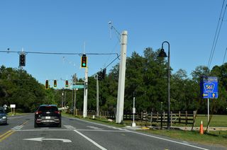 Traffic lights were added at CR 565A east at CR 561 (Lake Minneola Shores) after May 2025. CR 561 south leads to SR 50 west of Downtown Clermont. CR 561 north straddles Lake Minneola east to U.S. 27 in Minneola.