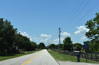 Lake County Road 565A overlays Montevista Road on a stair-stepped route to State Road 50 in eastern reaches of Groveland.