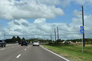 The second of three junction shields for County Road 54 installed along Bruce B. Downs Boulevard northbound by September 2025.