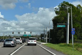 Eagleston Road returns to Bruce B. Downs Boulevard at a signalized intersection preceding the commercialized stretch along County Road 54. Traffic lights were fully activated here on May 22, 2023.