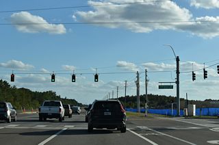 Traffic lights were added at the south intersection of Eagleston Boulevard with Bruce B. Downs Boulevard in 2022. A four-story apartment complex was built to the east of the signal in 2023.