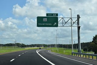 Located north of mile marker 67.5, the diamond interchange connecting Suncoast Parkway with SR 44 was initially unnumbered.