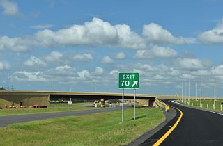 A wye interchange connects the north end of SR 589 with CR 486 (Norvell Bryant Highway) at Exit 70.