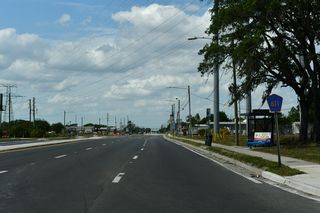 A confirming marker for CR 611 stands north of CR 296 (Bryan Dairy Road).