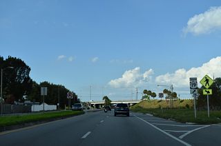 CR 611 (49th Street N) at the southbound ramp to U.S. 19. U.S. 19 transitions into a commercial arterial southeast from CR 611.