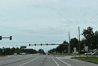 Heading into Clearwater, SR 590 angles southwest along NE Coachman Road to Drew Street and U.S. 19 Alternate at Downtown.