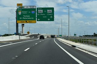 The tolled Gateway Expressway (SR 686A) leads southeast along SR 686 (Roosevelt Boulevard) to SR 690.