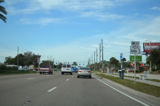 Leading away from U.S. 19, SR 686 follows East Bay Drive toward Downtown Largo.