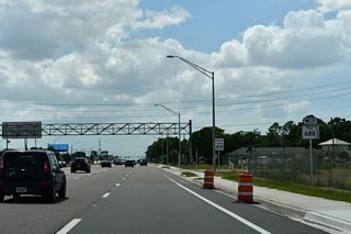 One quarter mile west of the ramps with Roosevelt Boulevard north is the signalized intersection joining SR 688 with 49th Street N.