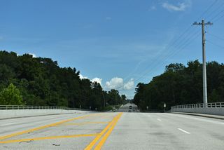 Henley Road ascends across Black Creek over a bridge built in 2011.