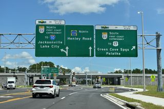 Henley Road proceeds north from the Village Park development and Lake Asbury Drive to meet the First Coast Expressway at Exit 28.