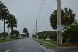 A second set of SR A1A/10 shields stands between Penman Road and Atlantic Village shopping center.