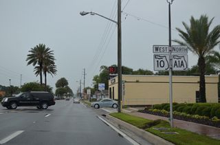 The first reassurance marker for SR 10 appears alongside SR A1A as Atlantic Boulevard leads away from 3rd Street along the Atlantic Beach and Neptune Beach city line. The two routes overlap for 1.1 miles.