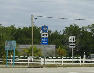 CR 892 (Goodland Road) north intersects CR 92 (San Marco Road) at the west end of the Goodland Bridge spanning the Big Marco River.