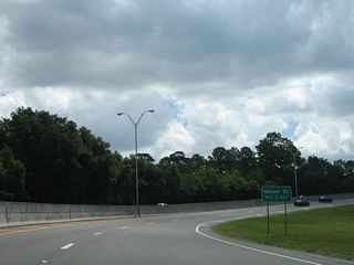 A tall barrier median was added to improve safety at the pre-2012 curve of U.S. 1 Alternate south by Henry L. Brown Kooker Park.