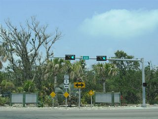 The east end of Flagler Avenue at SR A1A (South Roosevelt Boulevard). SR A1A north merges with U.S. 1 (Overseas Highway) nearby while south parallels Cow Key Channel and the Straits of Florida south and west to Key West International Airport (EYW) and Smathers Beach.