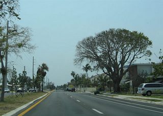 Flagler Avenue westbound after its beginning from SR A1A. The four lane boulevard serves residential areas between Kennedy Drive and SR A1A.