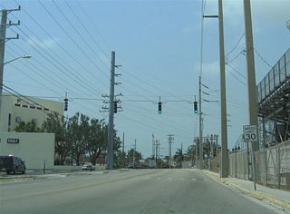 Kennedy Drive constitutes a four lane arterial between Flagler Avenue (Monroe County C5A) and U.S. 1 (North Roosevelt Boulevard) at Sigsbee Road to Dredgers Key. Kennedy Drive serves City Park in this scene near Northside Drive.