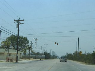 Continuing south to the flasher with South Street on Key Deer Boulevard. South Street leads east to Wilder Road and Winifred Street.