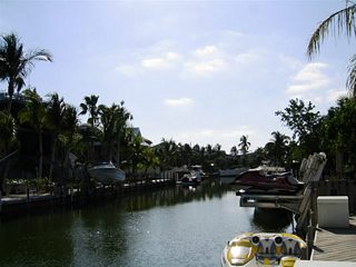 Canals are often incorporated into South Florida and Keys neighborhoods. They not only create more waterfront property, but also provide access to the bays, gulf, and ocean for water enthusiasts. Pictured here are two scenes of a neighborhood canal in Key Largo.