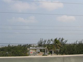 The entrance to Naval Air Station Key West as seen from U.S. 1 (Overseas Highway). The military base lies south of U.S. 1 via Saratoga Avenue on Boca Chica Key. The facility is home to a navy flight training school