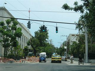 Looking at the Simonton Street southbound intersection with Caroline Street in downtown Key West. The U.S. District Court building resides on the southeast corner of the intersection.