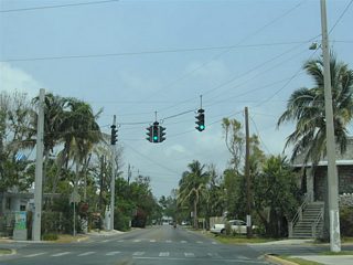 As South Street pushes east, the area becomes more residential. Reynolds Street meets South Street at a signalized intersection north of Astro City Park.