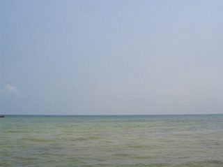 Looking outward at the Straits of Florida from the White Street Pier and Higgs Beach. A scant 90 miles separate Key West, Florida from the nation of Cuba. To the west is the Southernmost Point Monument and the Harry S. Truman Annex. Damaged pier remnants pictured here remained as a testament to the numerous hurricanes that skirted the area in the early 2000s. The White Street pier was closed at the time of these photos.