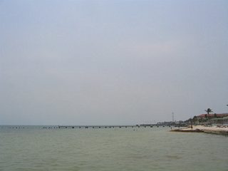Looking outward at the Straits of Florida from the White Street Pier and Higgs Beach. A scant 90 miles separate Key West, Florida from the nation of Cuba. To the west is the Southernmost Point Monument and the Harry S. Truman Annex. Damaged pier remnants pictured here remained as a testament to the numerous hurricanes that skirted the area in the early 2000s. The White Street pier was closed at the time of these photos.
