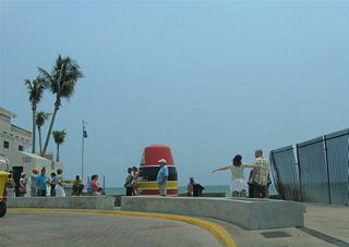 Whitehead Street southbound curves east to form South Street at the Southernmost Point Monument. The monument resembles a buoy as it faces the Straits of Florida waters adjacent to the Harry S. Truman Annex. A small peninsula (Whitehead Spit) within the Annex represents the actual southernmost location in the contiguous United States.