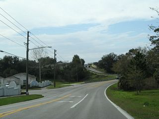 Beggs Road makes a second S-curve westbound between the Long Lake Villas and Westlakd subdivisions.
