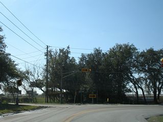 Sheeler Road south ends at the westerly turn onto Keene Road in south Apopka. A set of flashers and warning signs direct motorists onto Keene Road west toward both SR 414 east and Clarcona Road (CR 435).