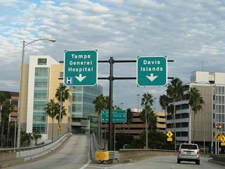 Two lanes veers southward onto Davis Boulevard, the main roadway along Davis Islands.