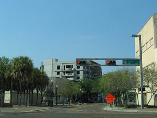 Franklin Street winds north across Tyler Street as a two lane brick street.