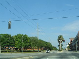 Palm Avenue eastbound at Nuccio Parkway and the Ybor City parking garage. Nuccio Parkway leads south to Downtown and northeast to the HCCC Ybor City campus at 15th Street.